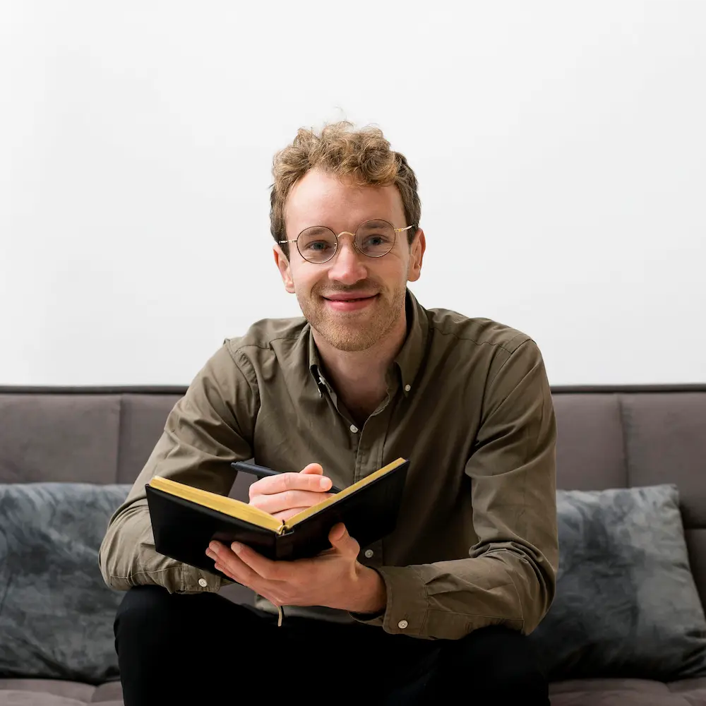 Ethan Cross, front view businessman working from home